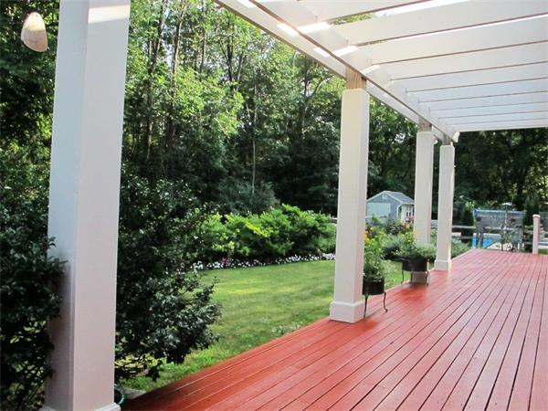 39 Highland Road Boxford, MA 01921 - Photo 24 of 30 a view of a backyard with garden