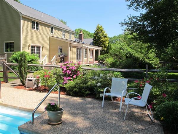 39 Highland Road Boxford, MA 01921 - Photo 27 of 30 a view of backyard with seating space and trees