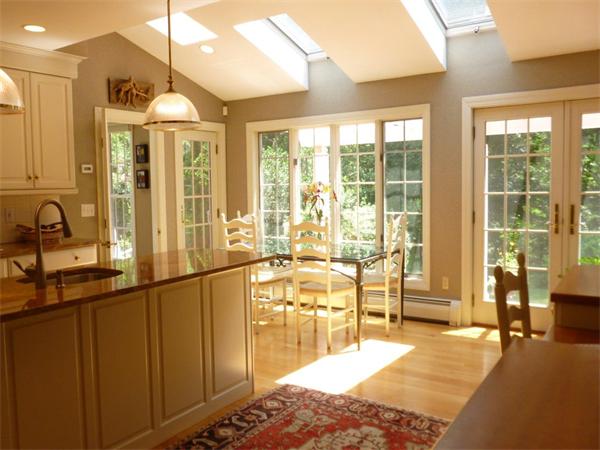 39 Highland Road Boxford, MA 01921 - Photo 8 of 30 a spacious bedroom with a large window and a chandelier
