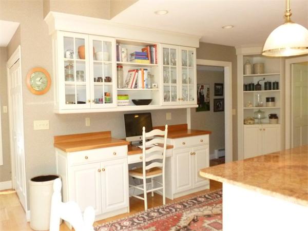 39 Highland Road Boxford, MA 01921 - Photo 9 of 30 a view of a kitchen with a stove top oven