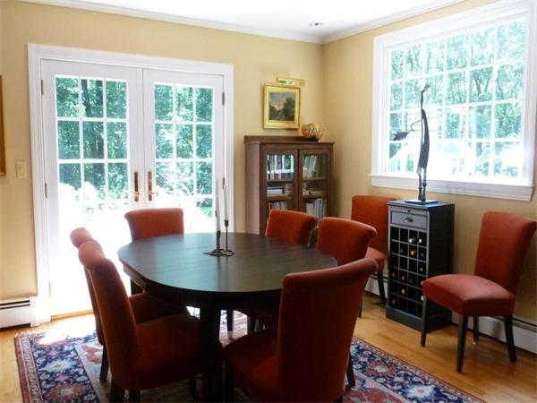 39 Highland Road Boxford, MA 01921 - Photo 10 of 30 a view of a dining room with furniture window and outside view