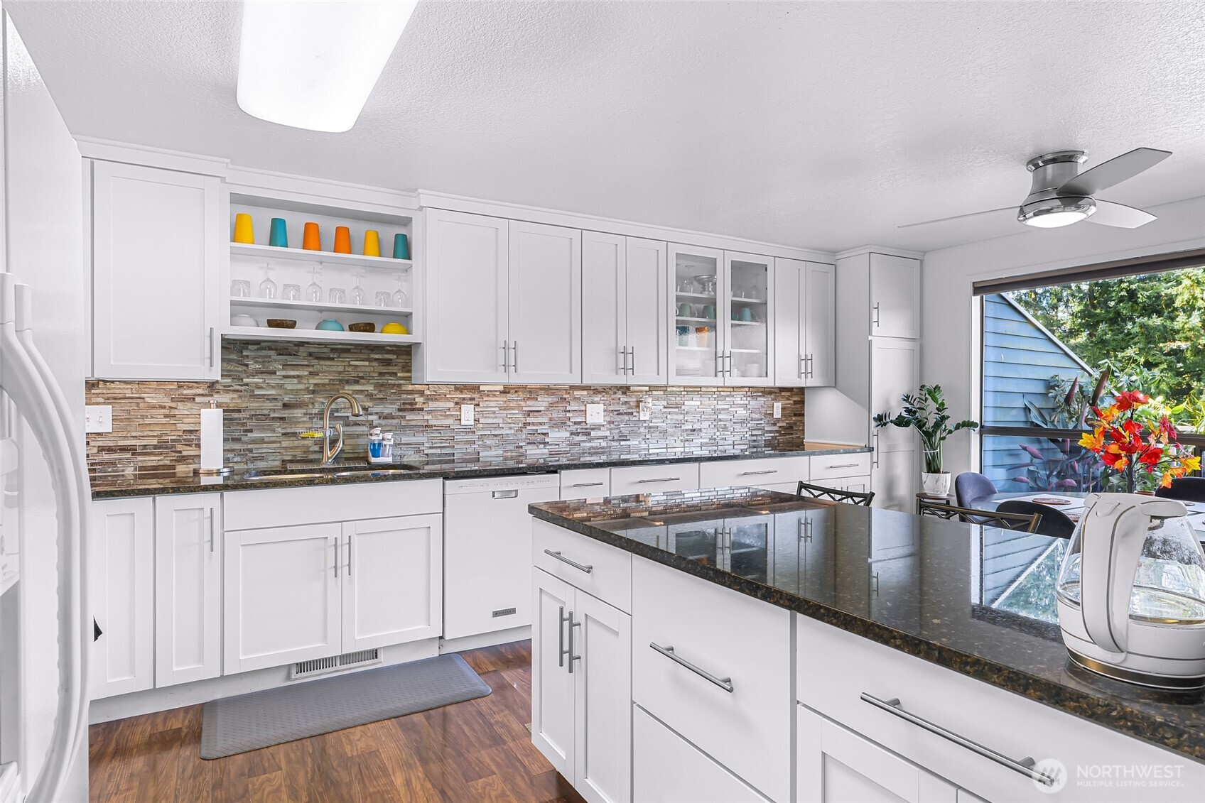 3500 Ridgemont Way, Unit 3 Bellingham, WA 98229 - Photo 12 of 39 a kitchen with stainless steel appliances granite countertop a sink a stove and cabinets