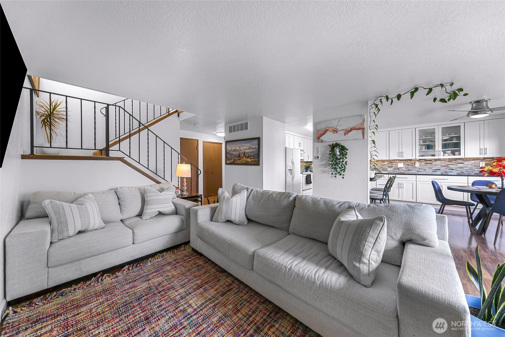 3500 Ridgemont Way, Unit 3 Bellingham, WA 98229 - Photo 10 of 39 a living room with furniture white walls and a table