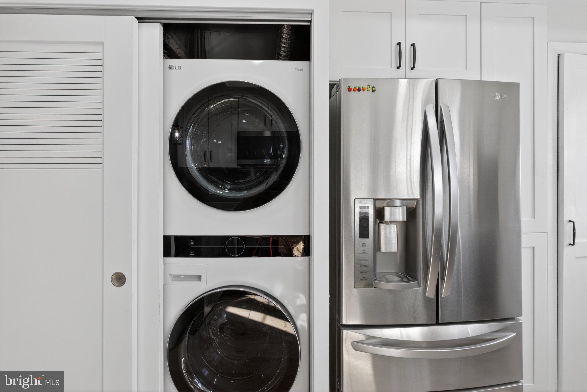 2015 Gales Street Northeast Washington, DC 20002 - Photo 9 of 10 a view of a refrigerator and washer in a kitchen