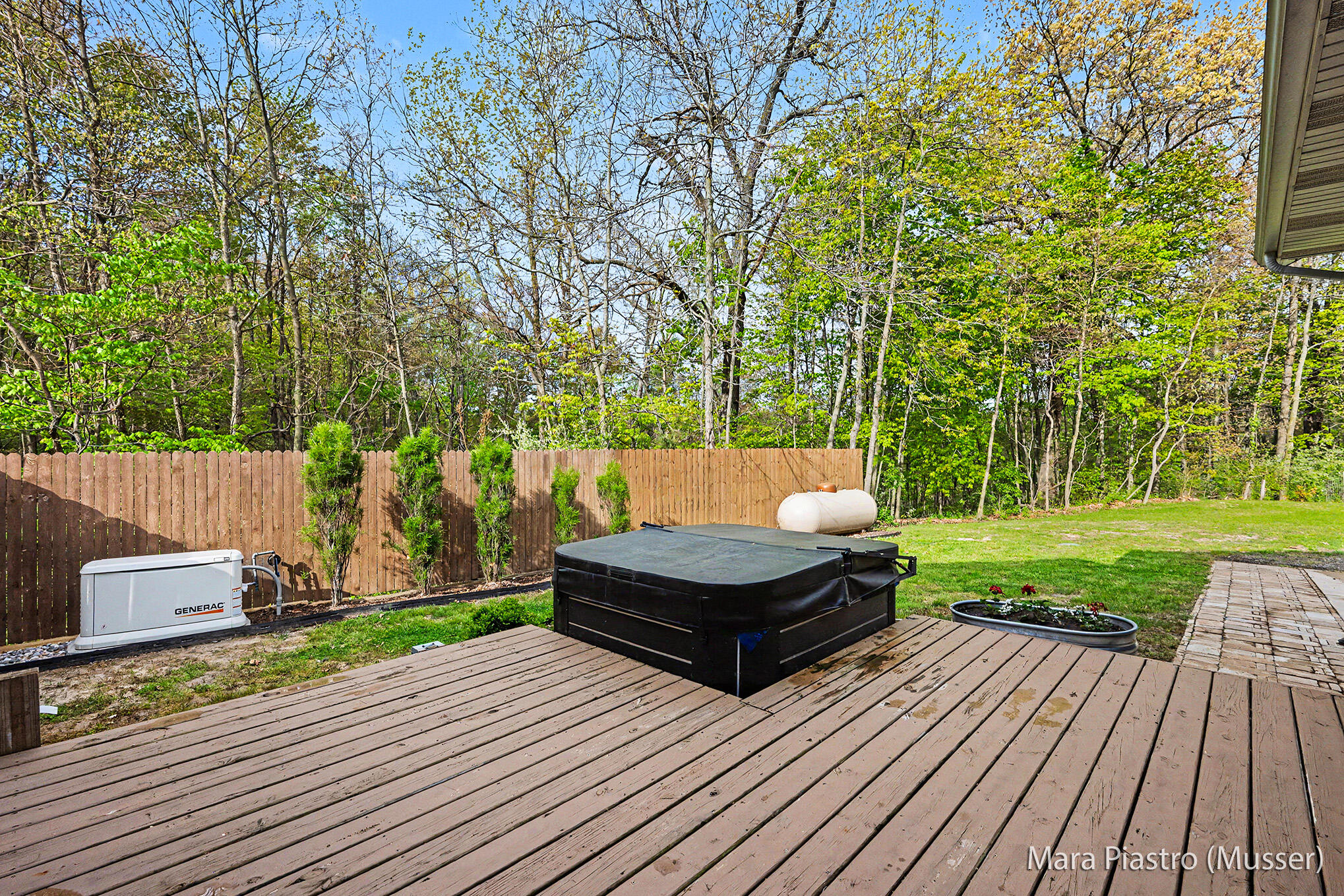 7873 Marsh Road Plainwell, MI 49080 - Photo 23 of 38 Deck, Jacuzzi & Generac