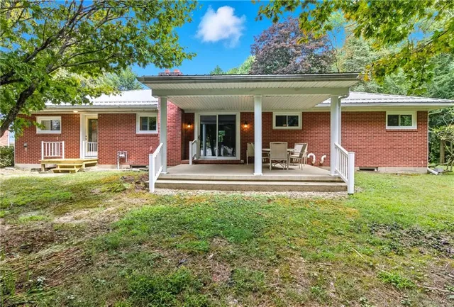 front view of a house with a yard