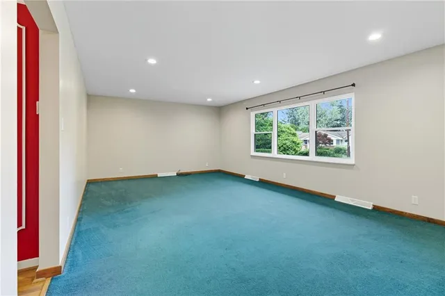 an empty room with a window