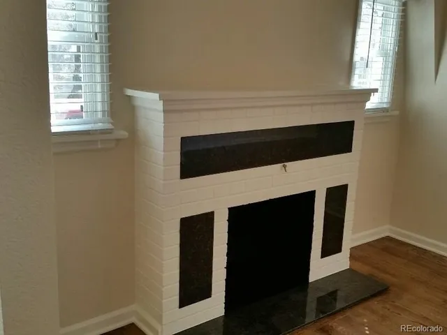 a close view of a fireplace in front of a room