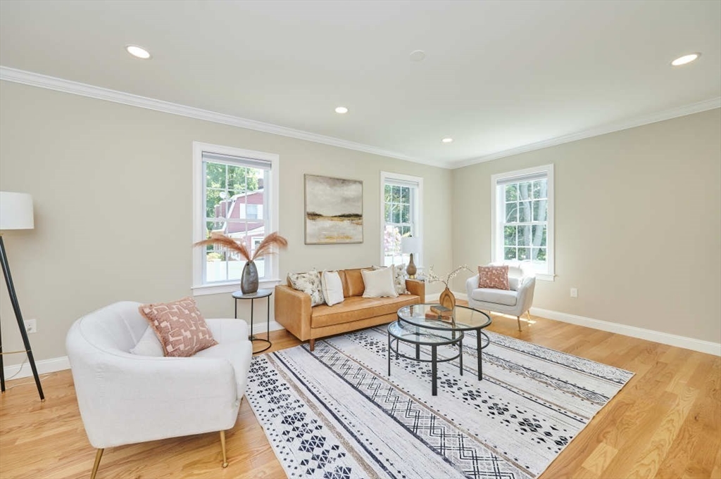 60 Peach Orchard Road Burlington, MA 01803 - Photo 17 of 42 a living room with furniture and a rug