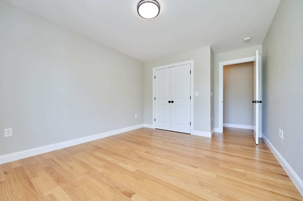 60 Peach Orchard Road Burlington, MA 01803 - Photo 28 of 42 a view of an empty room and wooden floor
