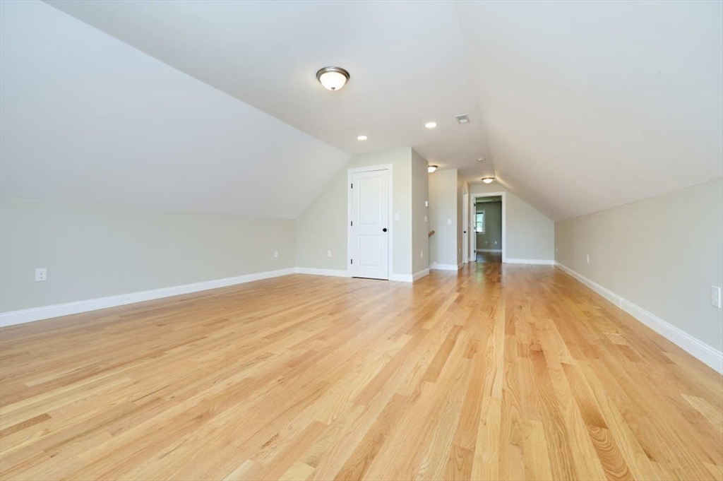60 Peach Orchard Road Burlington, MA 01803 - Photo 36 of 42 a view of empty room with wooden floor