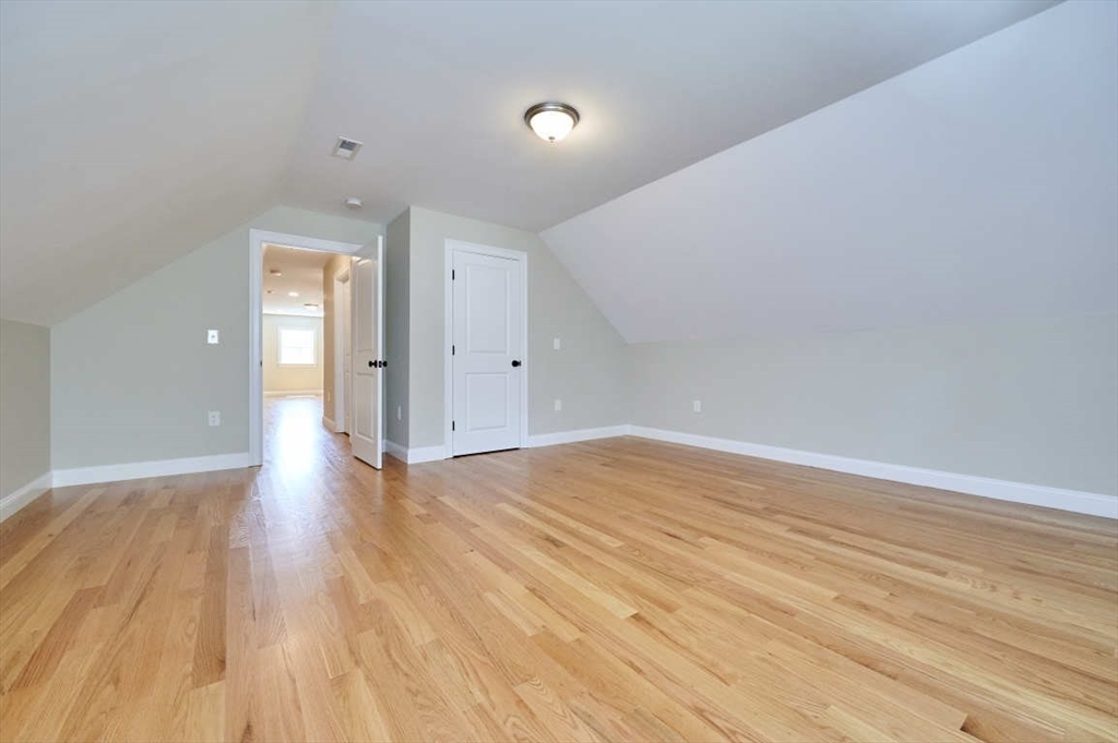 60 Peach Orchard Road Burlington, MA 01803 - Photo 38 of 42 a view of empty room with wooden floor