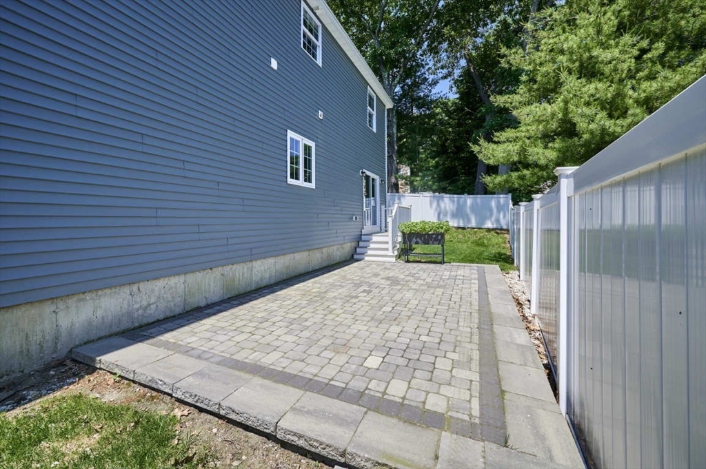 60 Peach Orchard Road Burlington, MA 01803 - Photo 4 of 42 a view of a backyard