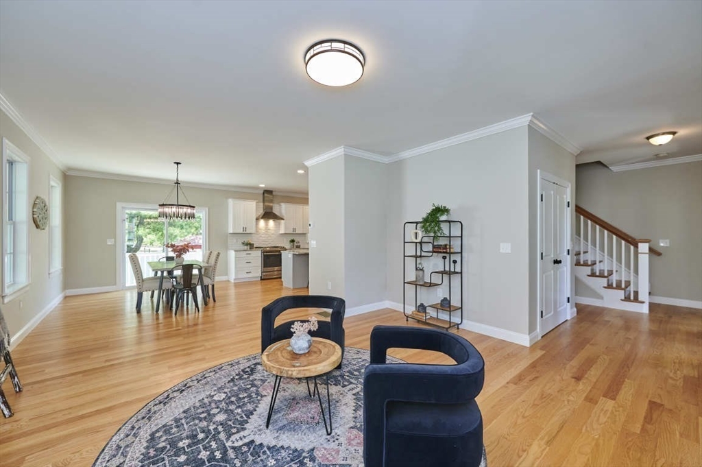 60 Peach Orchard Road Burlington, MA 01803 - Photo 9 of 42 a living room with furniture and a table