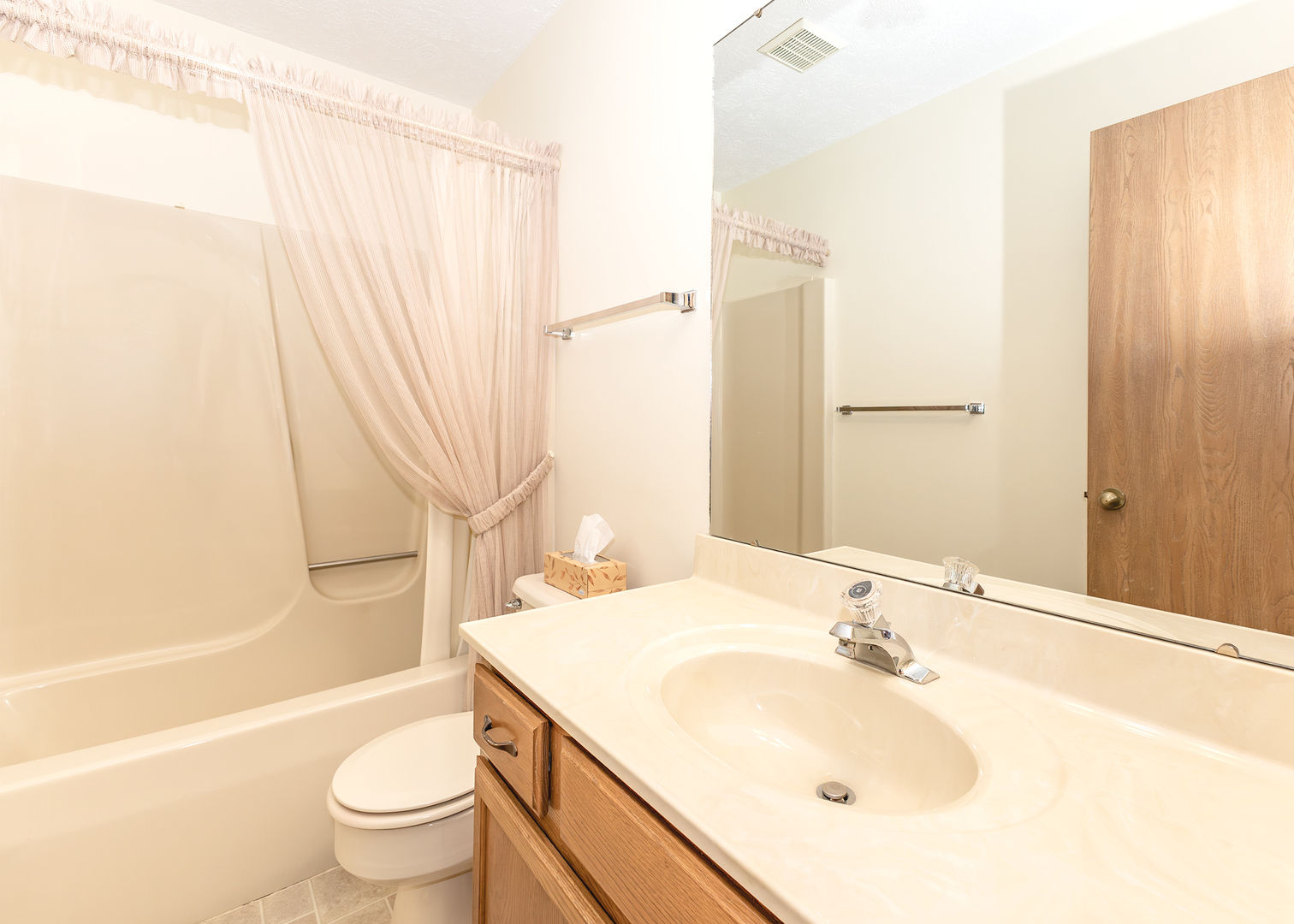 4237 26th Avenue, Unit 1 Moline, IL 61265 - Photo 12 of 18 a bathroom with a sink toilet and shower
