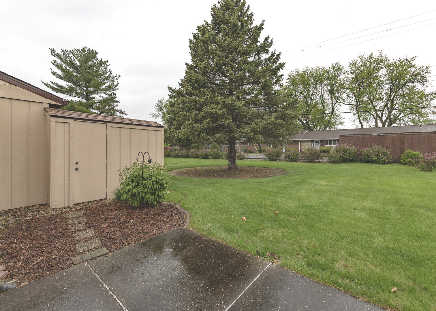 4237 26th Avenue, Unit 1 Moline, IL 61265 - Photo 2 of 18 a view of backyard with garden