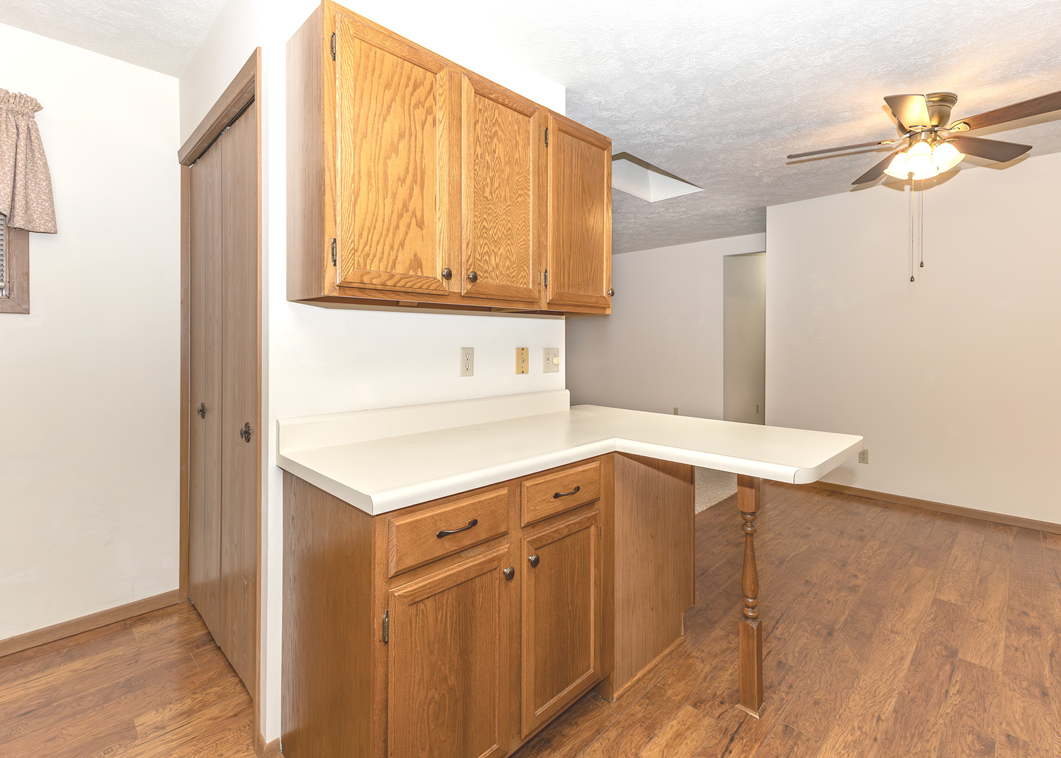 4237 26th Avenue, Unit 1 Moline, IL 61265 - Photo 10 of 18 a kitchen with a sink cabinets and a window