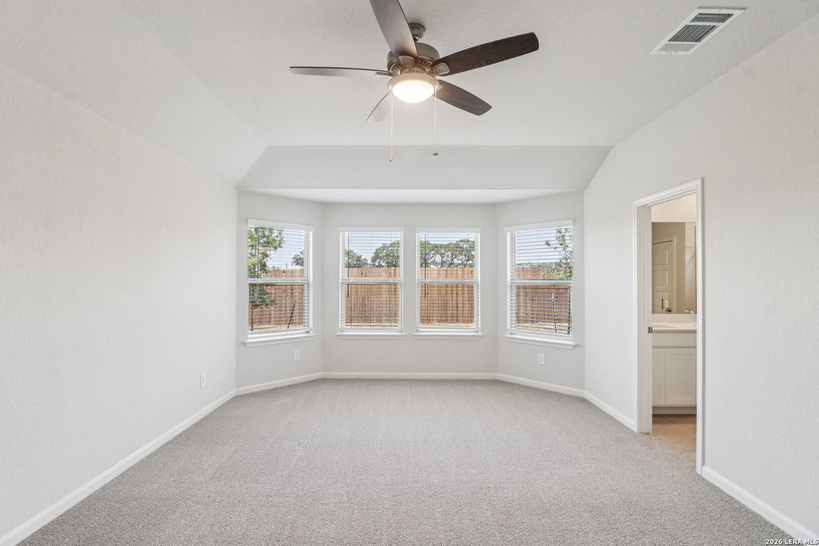 9909 Paladin Ridge San Antonio, TX 78254 - Photo 19 of 41 a view of an empty room with a window