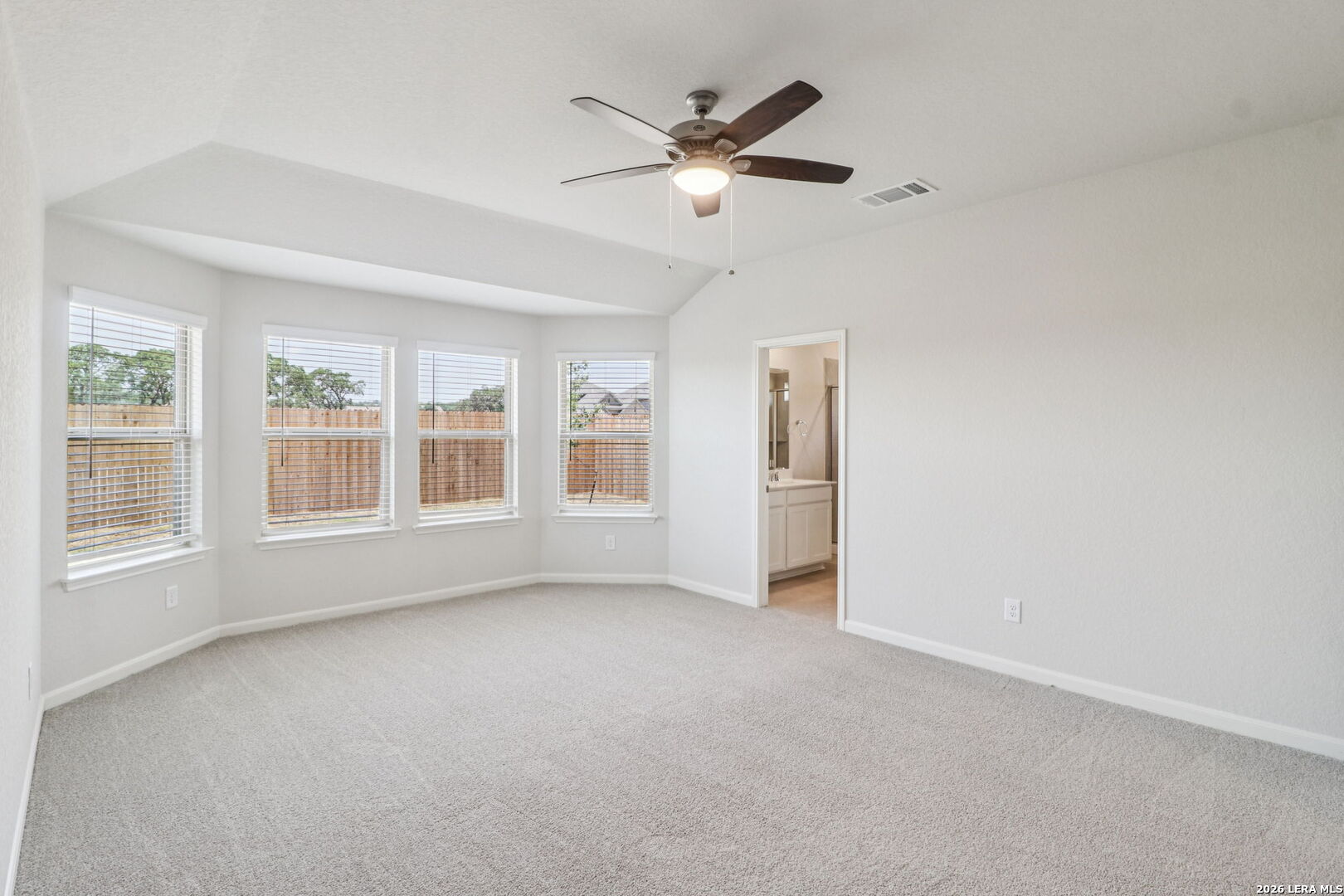 9909 Paladin Ridge San Antonio, TX 78254 - Photo 21 of 41 a view of an empty room with a window
