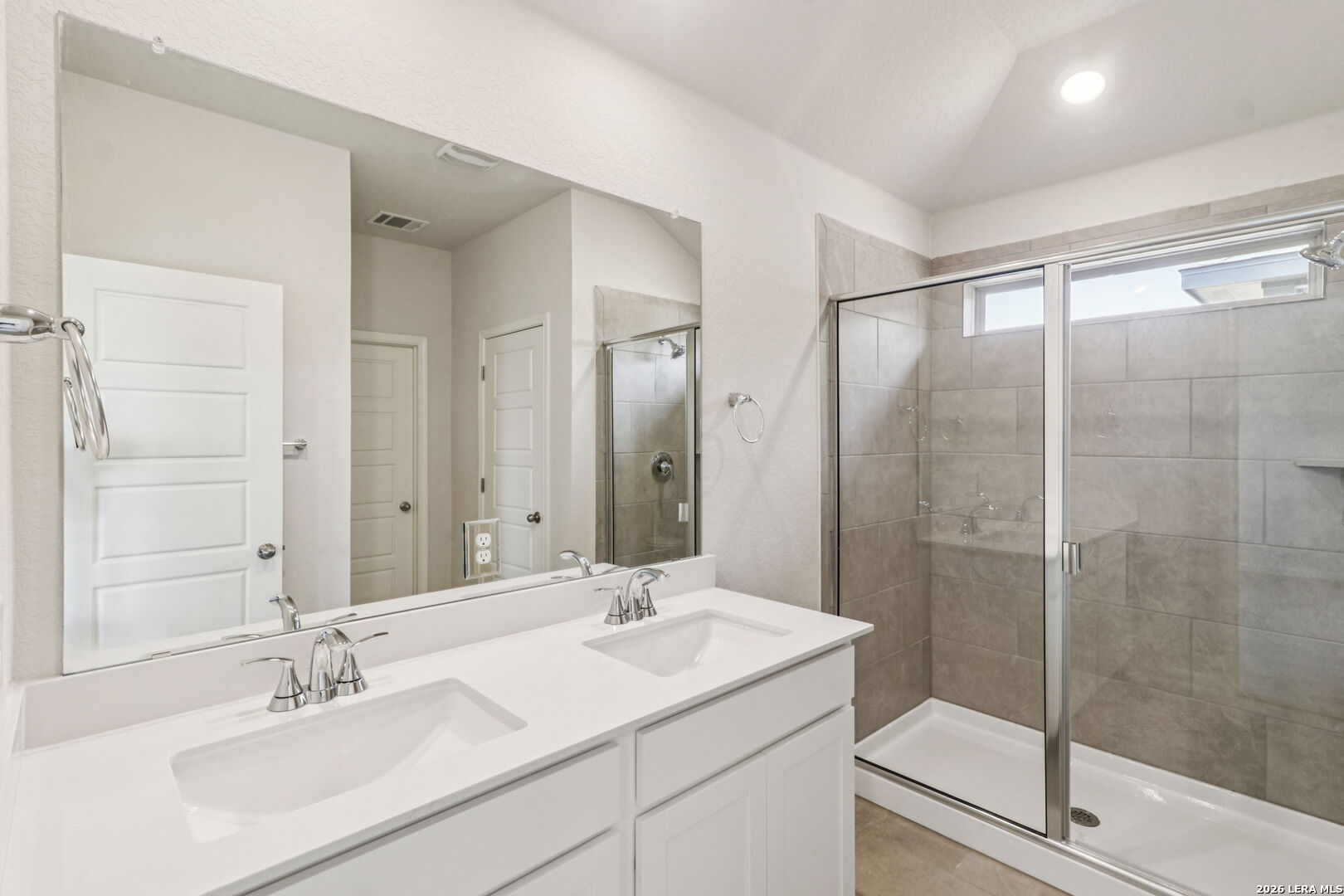 9909 Paladin Ridge San Antonio, TX 78254 - Photo 23 of 41 a bathroom with a sink and a mirror