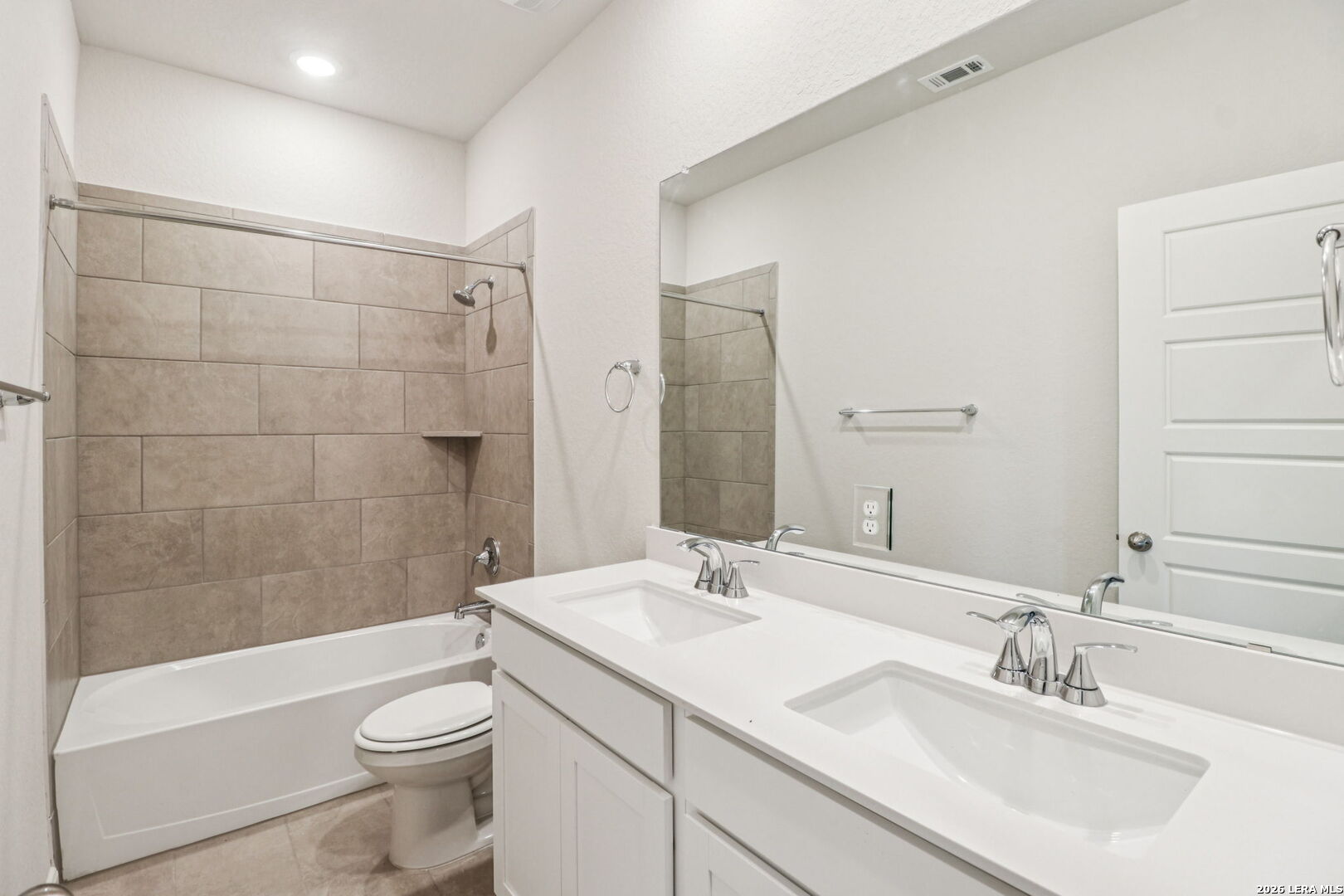 9909 Paladin Ridge San Antonio, TX 78254 - Photo 27 of 41 a bathroom with a sink a toilet and shower