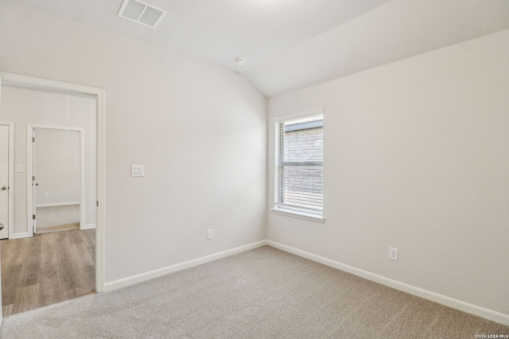 9909 Paladin Ridge San Antonio, TX 78254 - Photo 31 of 41 an empty room with windows and closet