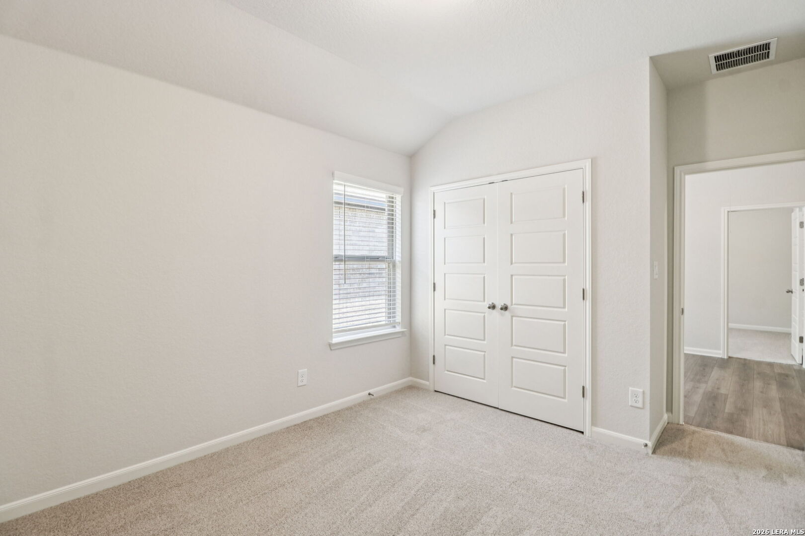 9909 Paladin Ridge San Antonio, TX 78254 - Photo 33 of 41 an empty room with windows