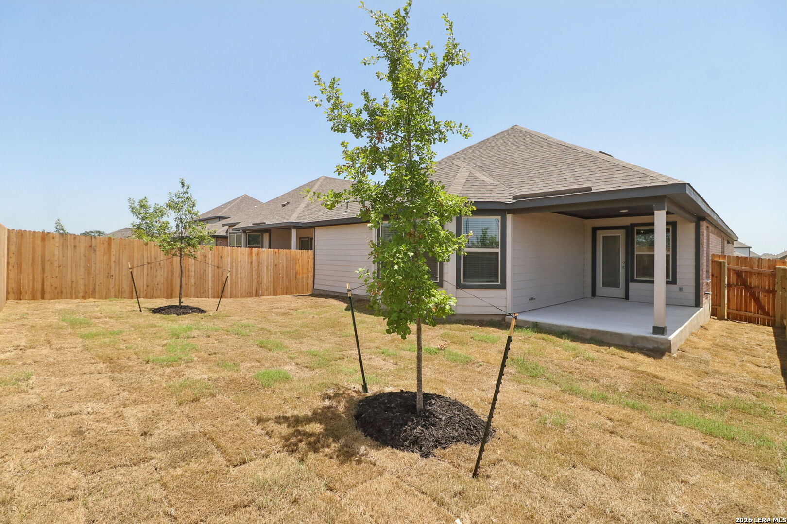 9909 Paladin Ridge San Antonio, TX 78254 - Photo 35 of 41 a house view with a backyard space