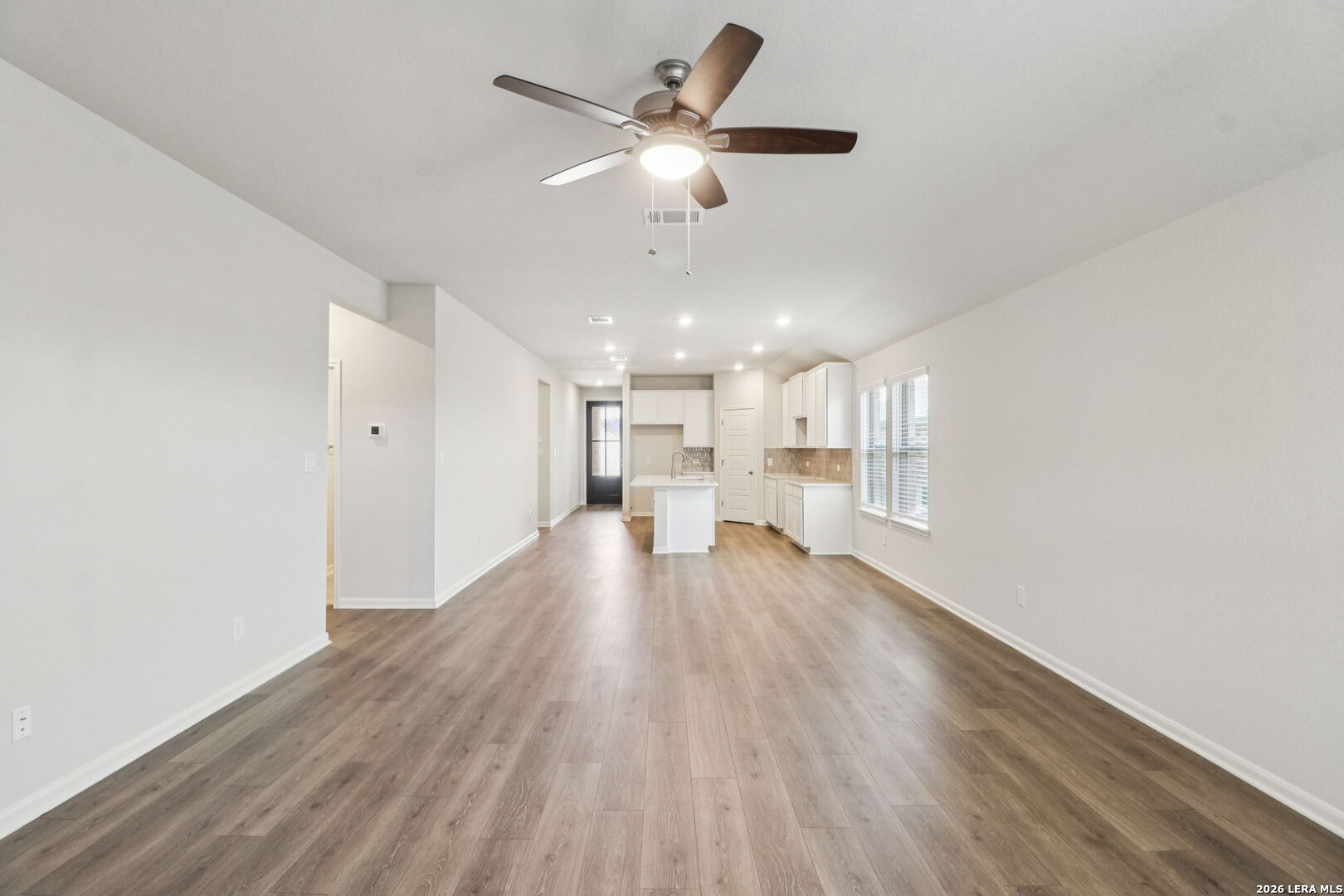 9909 Paladin Ridge San Antonio, TX 78254 - Photo 9 of 41 a view of an empty room and kitchen view