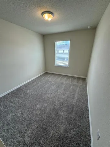 a bathroom with a double vanity sink toilet and shower
