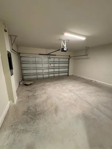 a view of a room with wooden walls