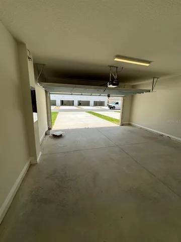 a view of swimming pool with seating space