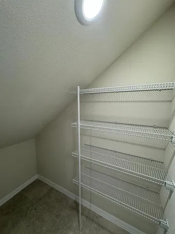 a view of kitchen and dining room with furniture