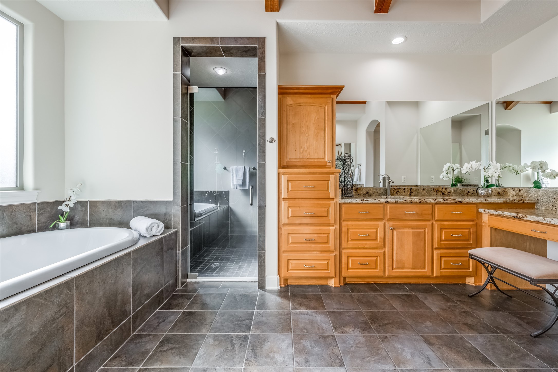 31102 Lower Oxbow Trace Fulshear, TX 77441 - Photo 22 of 50 Wonderful huge Primary bathroom with large shower with glass door, huge soaking tub, tile floor, lots of cabinets, dual vanity units, large mirrors, 2 large closets
