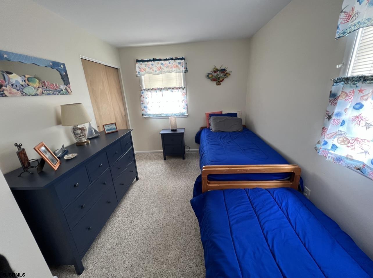 215 2nd Street North, Unit 1 Brigantine, NJ 08203 - Photo 16 of 24 a room with furniture and window