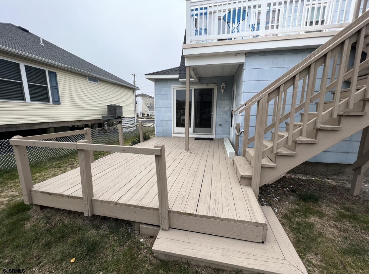 215 2nd Street North, Unit 1 Brigantine, NJ 08203 - Photo 21 of 24 a view of house with deck front of house