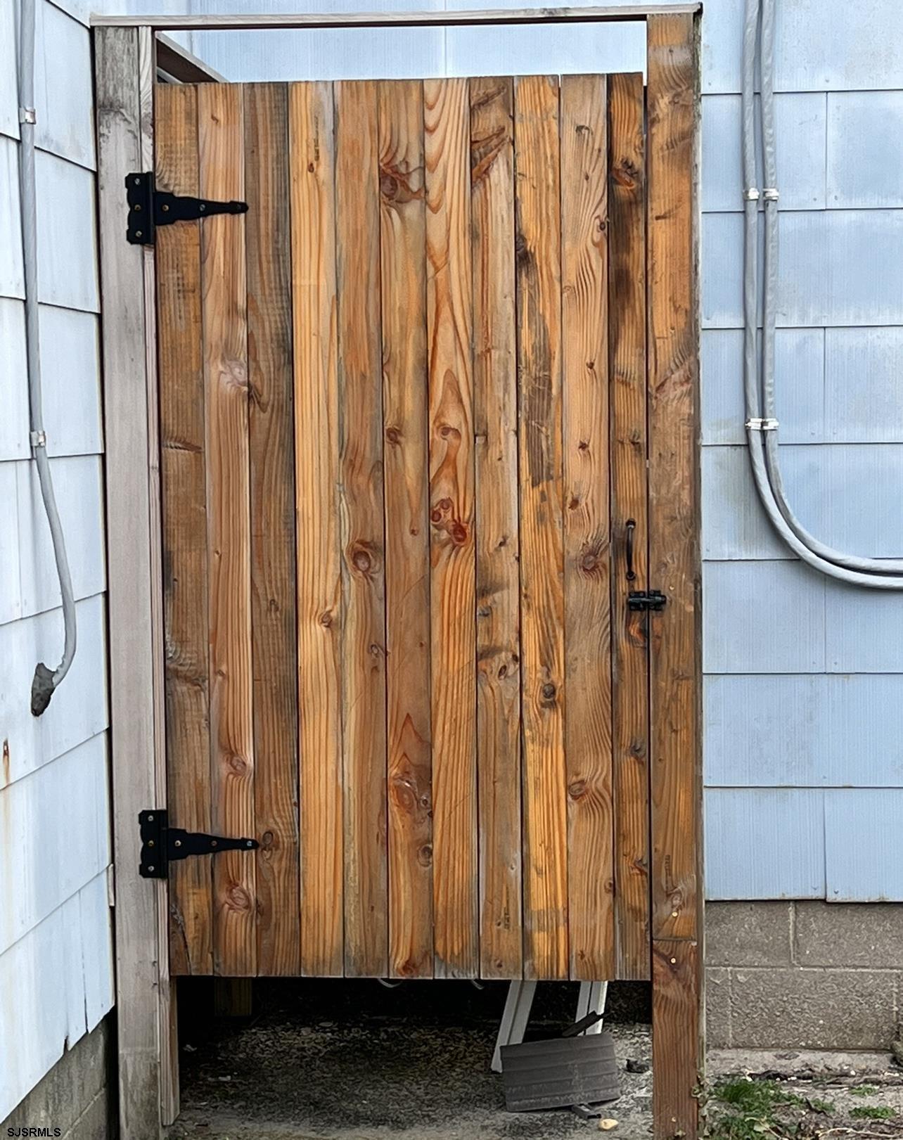 215 2nd Street North, Unit 1 Brigantine, NJ 08203 - Photo 22 of 24 a view of a door with a glass door