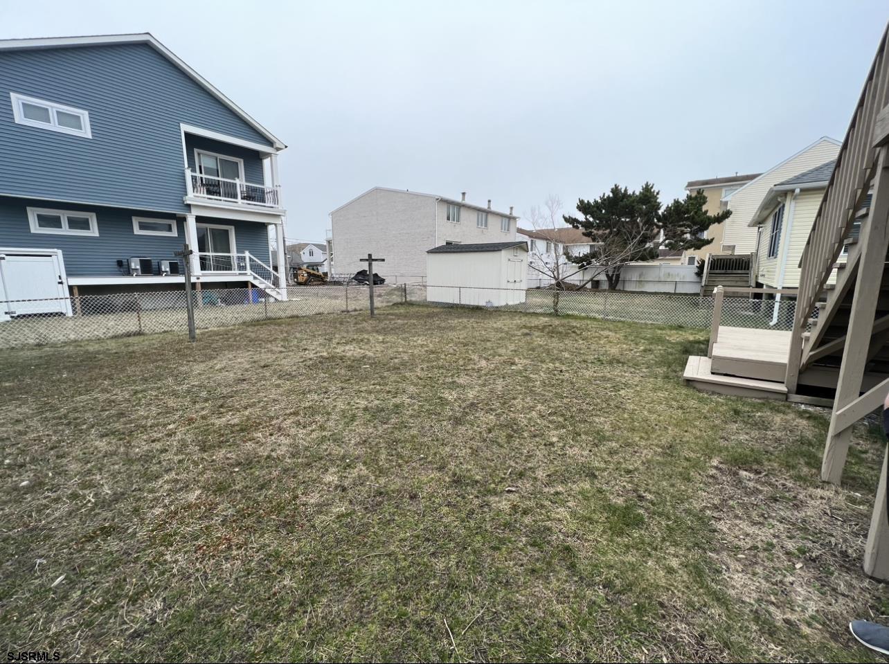 215 2nd Street North, Unit 1 Brigantine, NJ 08203 - Photo 24 of 24 a view of a house with backyard