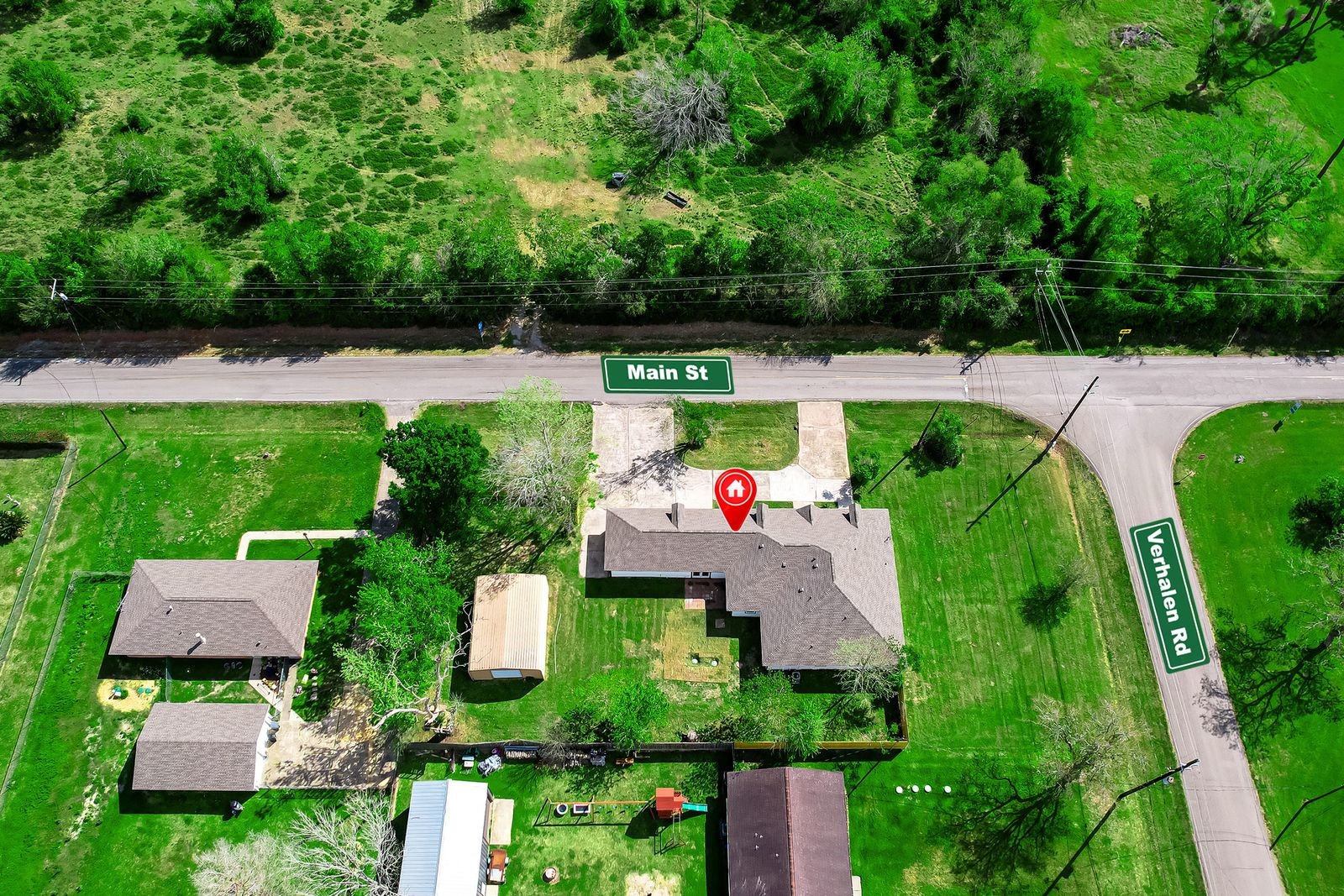 1214 Main Street Alvin, TX 77511 - Photo 22 of 26 an aerial view of house with yard swimming pool and outdoor seating