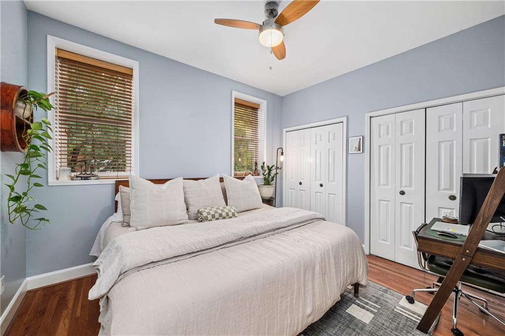 1116 Piedmont Avenue Northeast, Unit 10 Atlanta, GA 30309 - Photo 21 of 59 a bedroom with a bed and a window