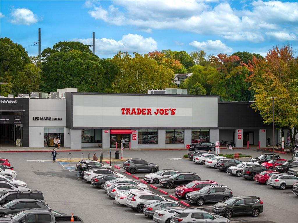 1116 Piedmont Avenue Northeast, Unit 10 Atlanta, GA 30309 - Photo 51 of 59 a front view of a building with cars parked