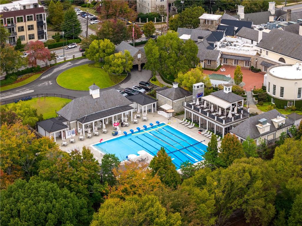 1116 Piedmont Avenue Northeast, Unit 10 Atlanta, GA 30309 - Photo 58 of 59 an aerial view of residential houses with outdoor space and swimming pool