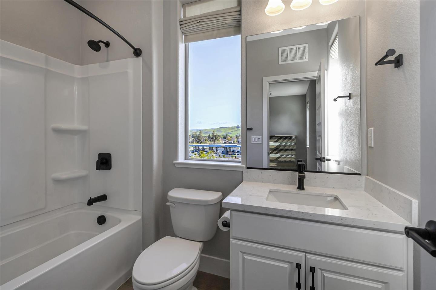 6823 Vector Court San Jose, CA 95119 - Photo 28 of 51 a bathroom with a sink toilet and shower