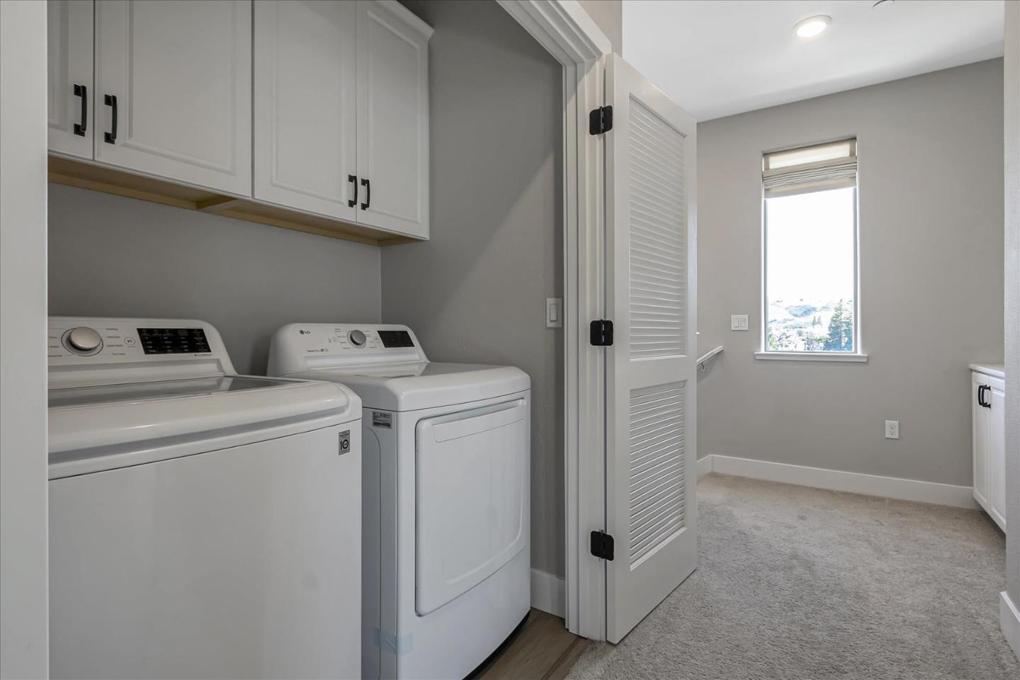 6823 Vector Court San Jose, CA 95119 - Photo 33 of 51 a utility room with dryer and washer
