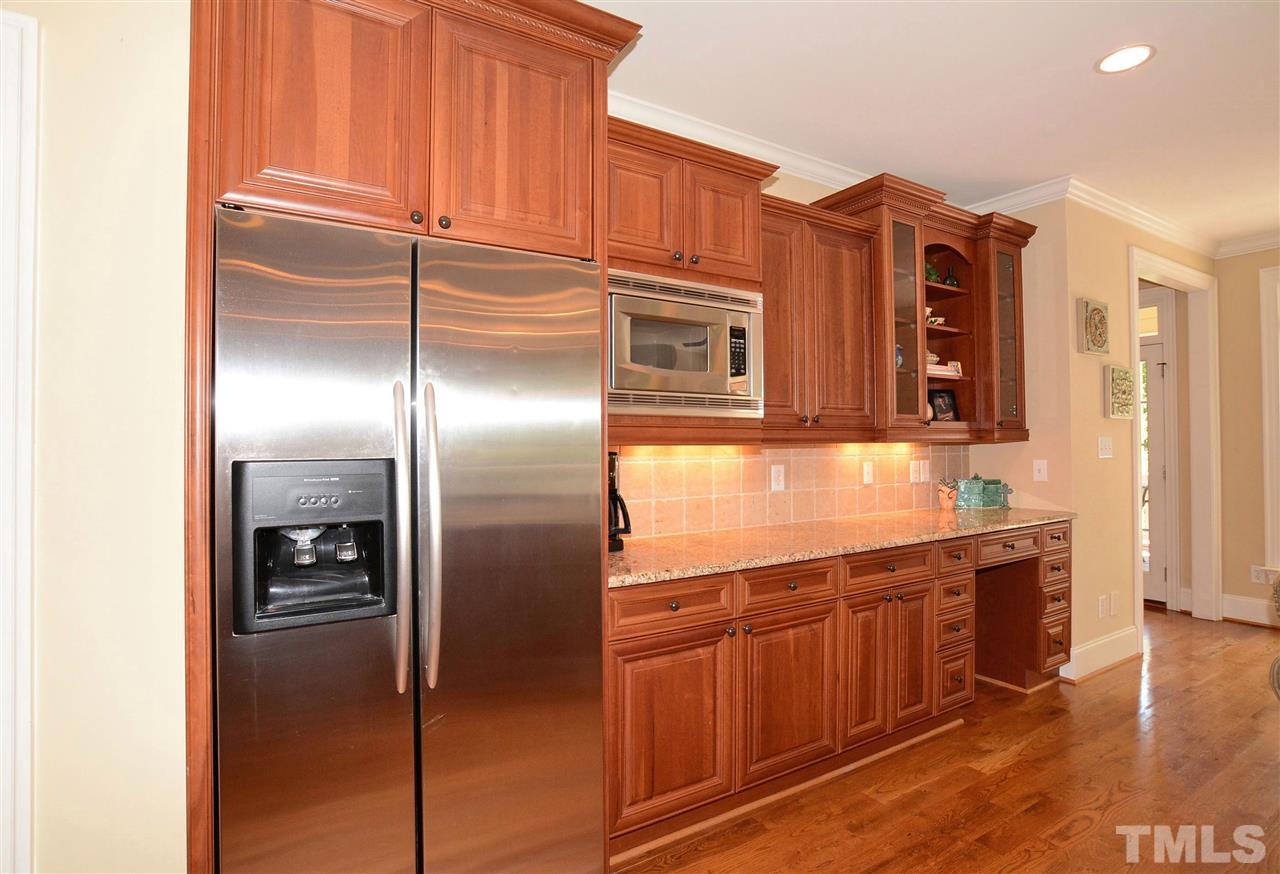 1089 Tacketts Pond Drive Raleigh, NC 27614 - Photo 15 of 30 Lots of Cabinet Space plus Built-in Desk Area.