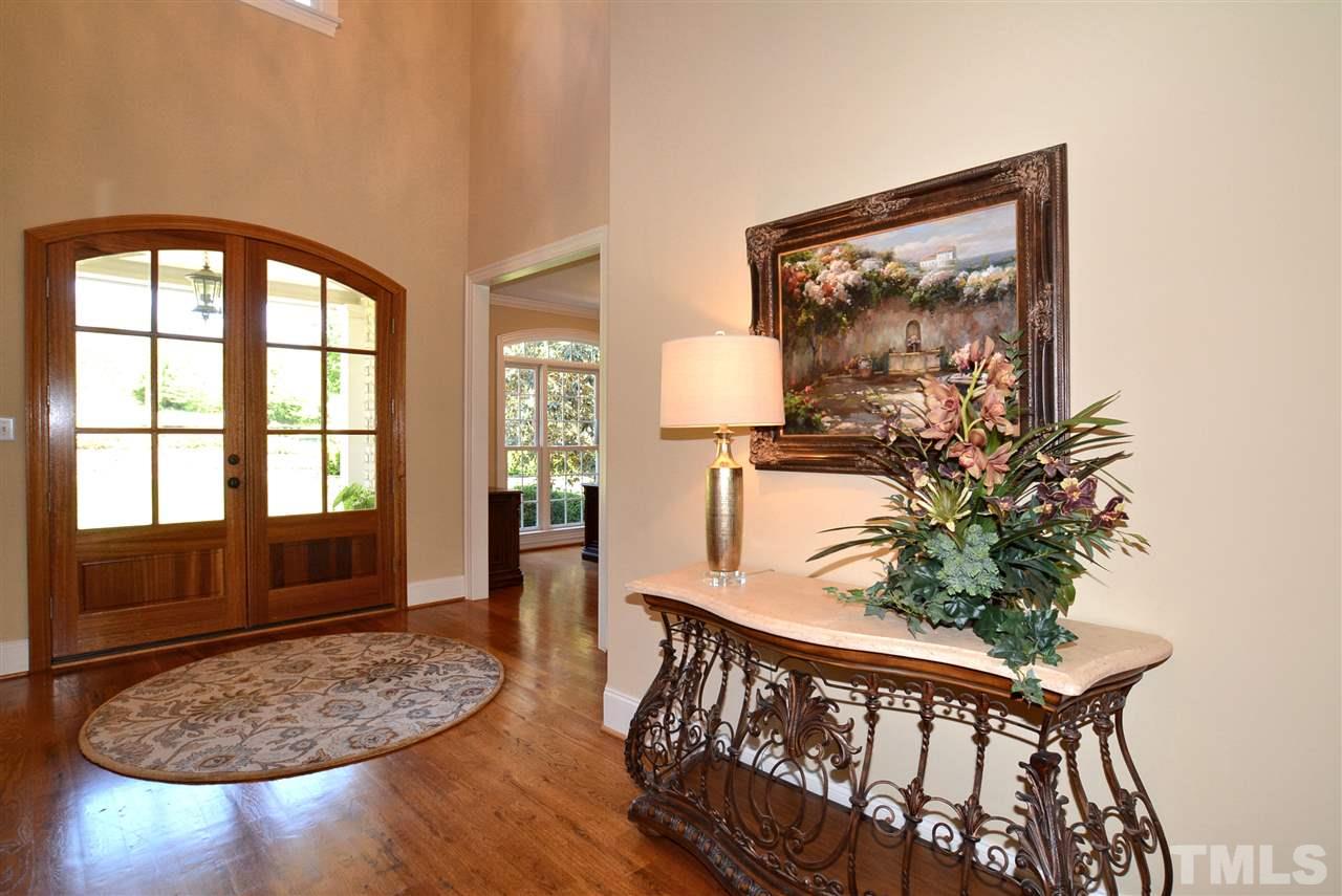 1089 Tacketts Pond Drive Raleigh, NC 27614 - Photo 5 of 30 2-Story Foyer opens to the Formal Dining & Office. Lovely Hardwood Flooring throughout the 1st Floor except in MBR Suite.