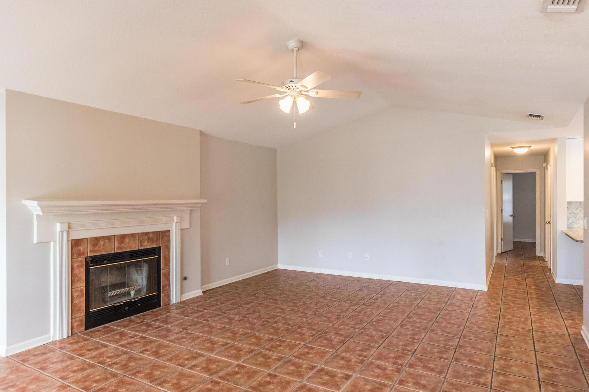 52 Rue D Honfleur Destin, FL 32541 - Photo 2 of 22 a view of a livingroom with a fireplace