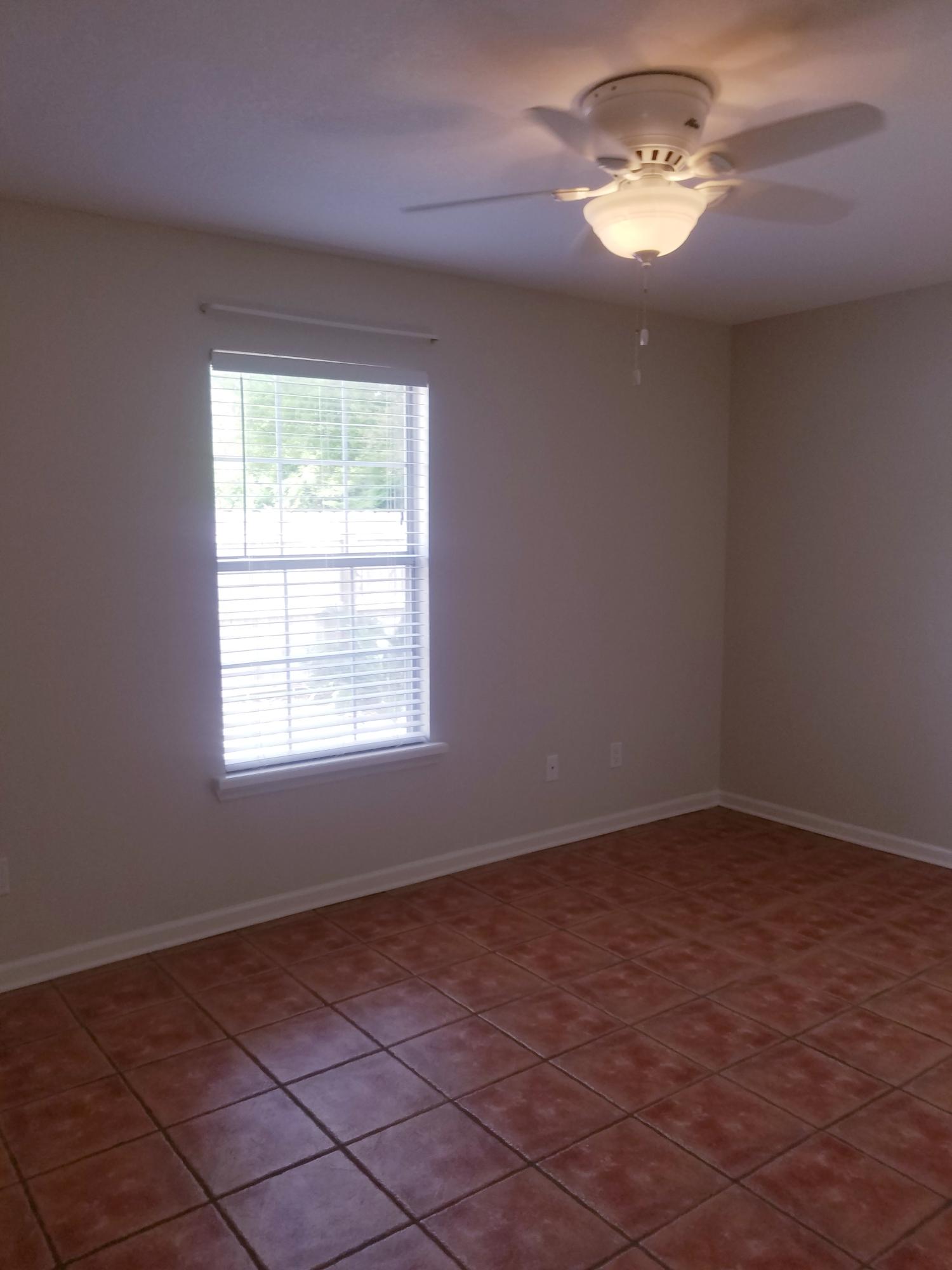 52 Rue D Honfleur Destin, FL 32541 - Photo 13 of 22 a view of a livingroom with a chandelier fan and windows