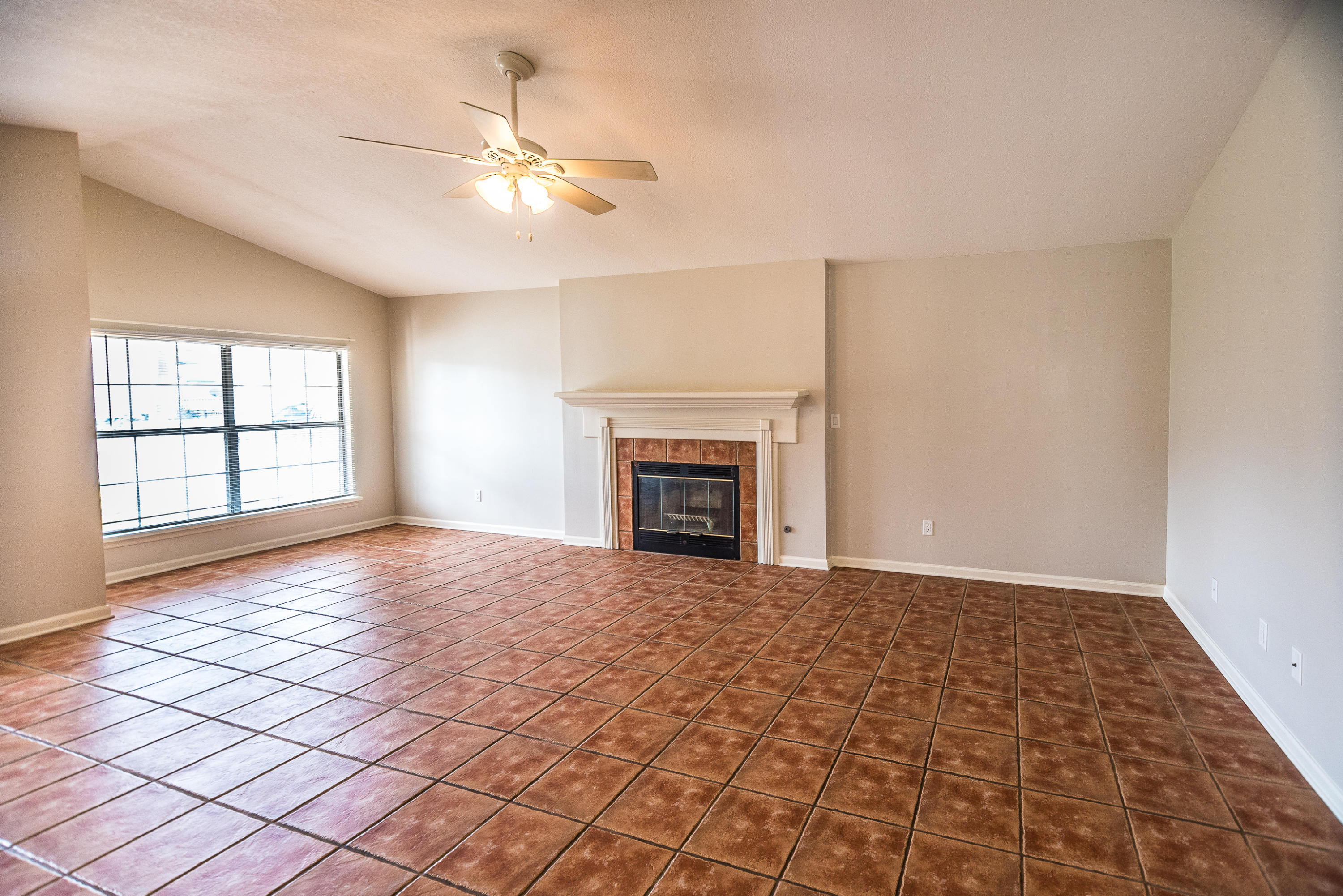 52 Rue D Honfleur Destin, FL 32541 - Photo 3 of 22 a view of an empty room with window and fireplace