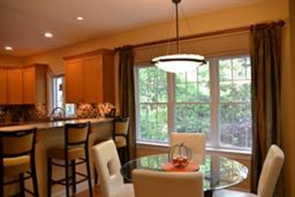 3 Indian Woods Way, Unit 3 Canton, MA 02021 - Photo 4 of 10 a view of a dining room with furniture window and outside view